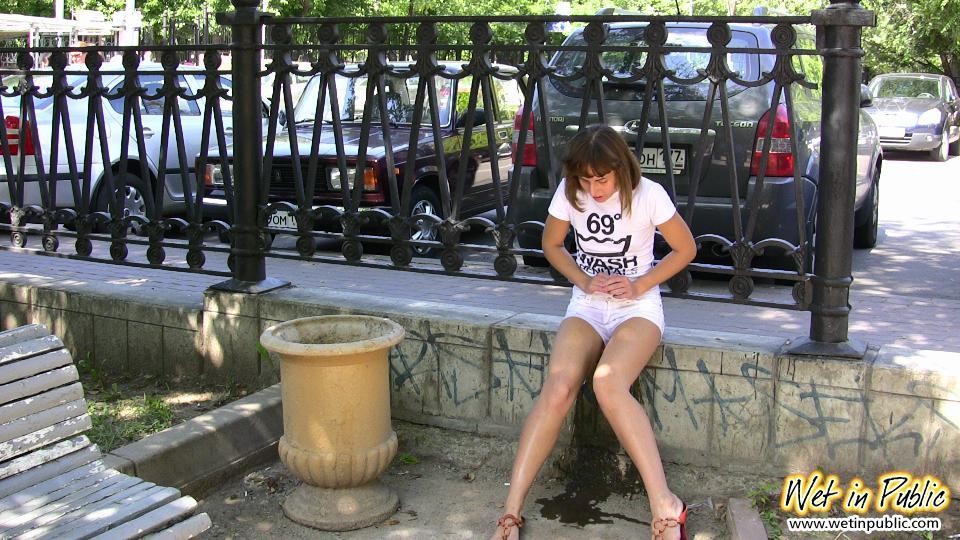 Public pissing shame of a babe in the white shorts and her nude pussy #78594963