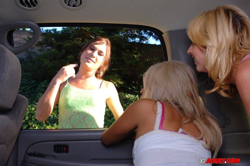 three horny girls kissing inside the car #78185711