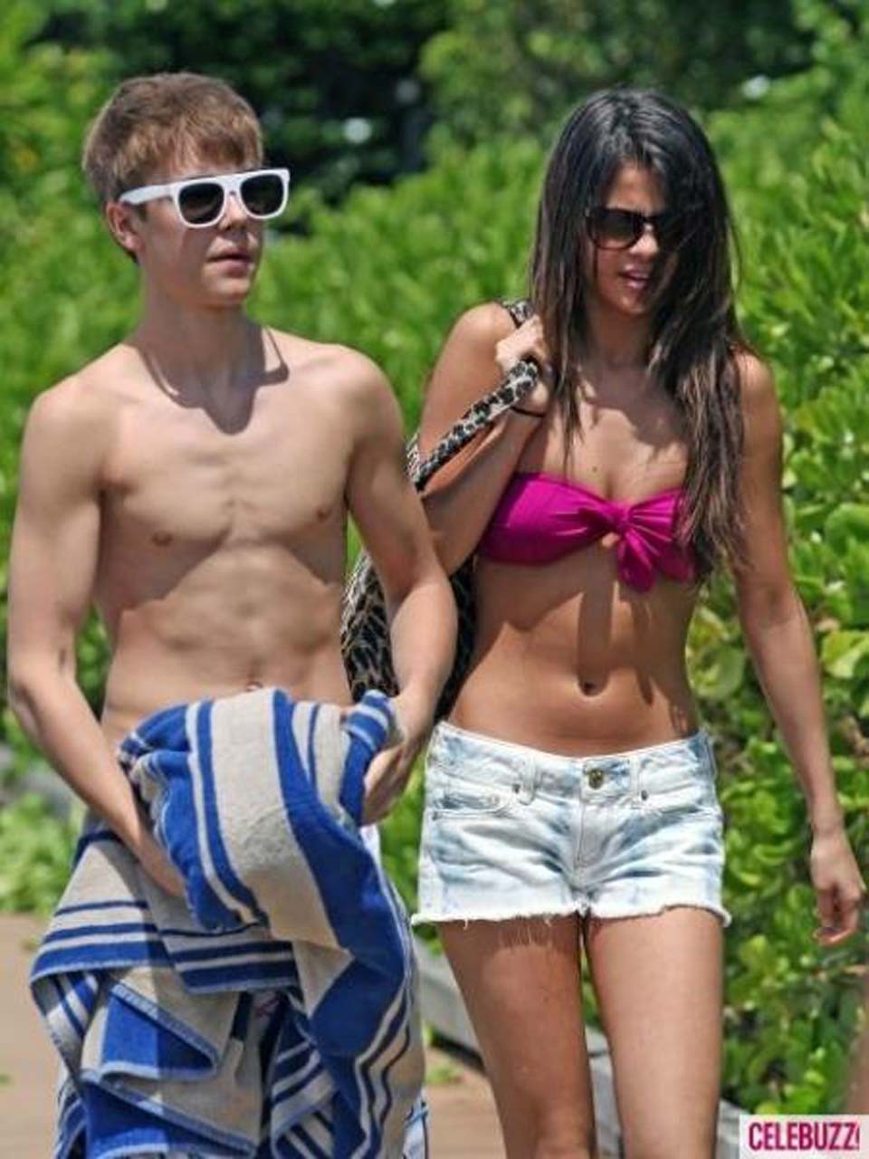 Selena Gomez exposing sexy body in bikini while walking with her boyfriend #75303336