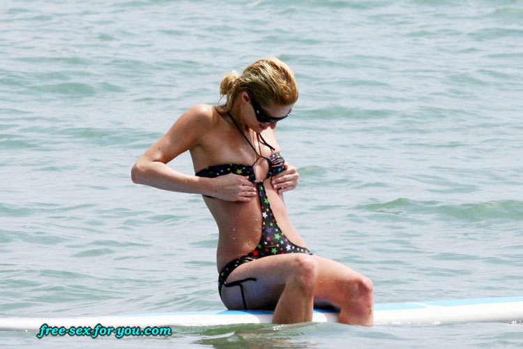 Paris Hilton showing tits while learning to surf paparazzi pix #75432083