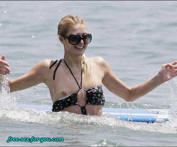 Paris hilton showing tits while learning to surf paparazzi pix
 #75432138