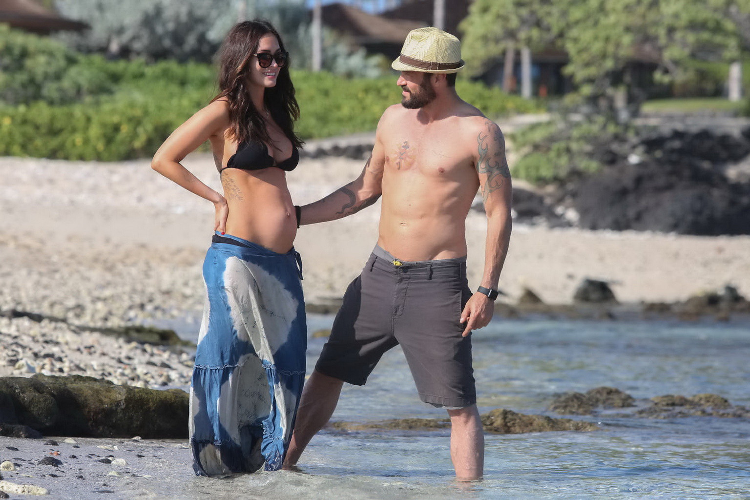 Megan Fox showing her boobs and big belly in black bikini #75143314