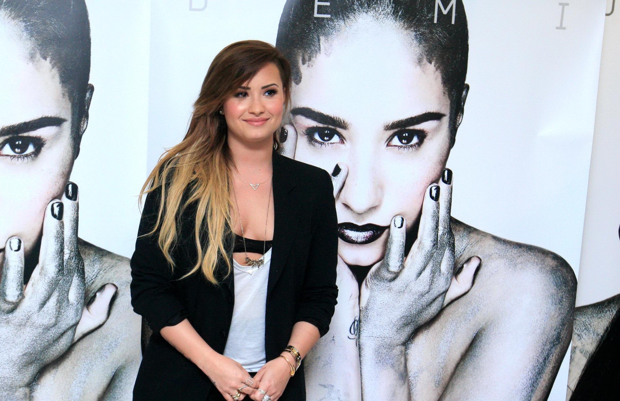 Demi Lovato black bra peek at her new single promotion in Sao Paulo #75198650