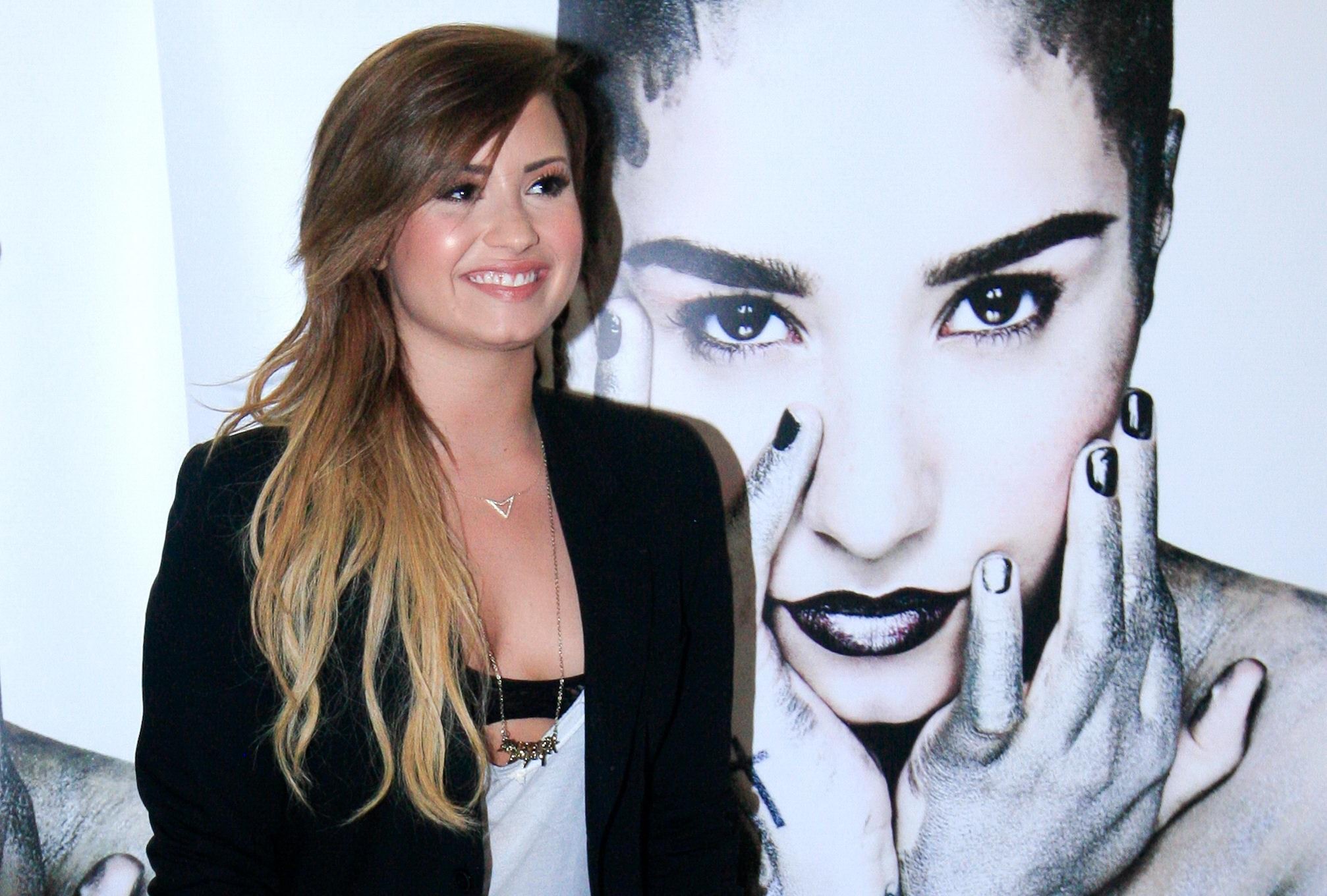 Demi Lovato black bra peek at her new single promotion in Sao Paulo #75198689