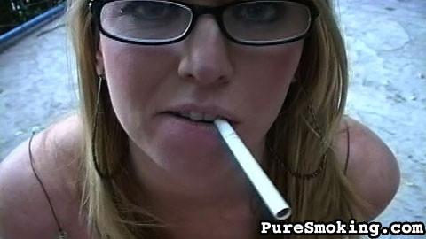 This blonde loves having something long in her mouth, whether it's a cigarette o #68097647