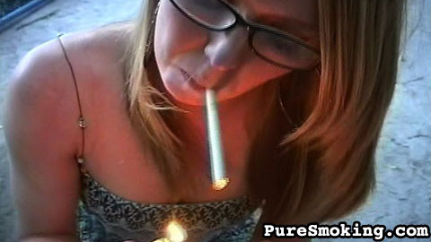 This blonde loves having something long in her mouth, whether it's a cigarette o #68097654