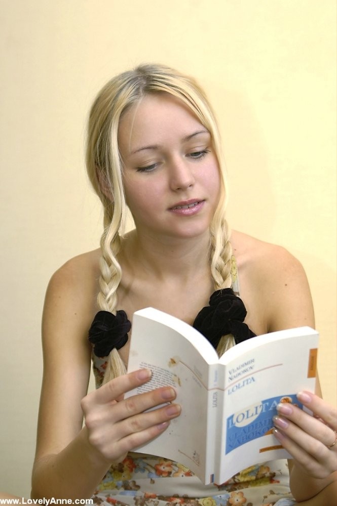 Anne Young chick reading a book naked #67134306