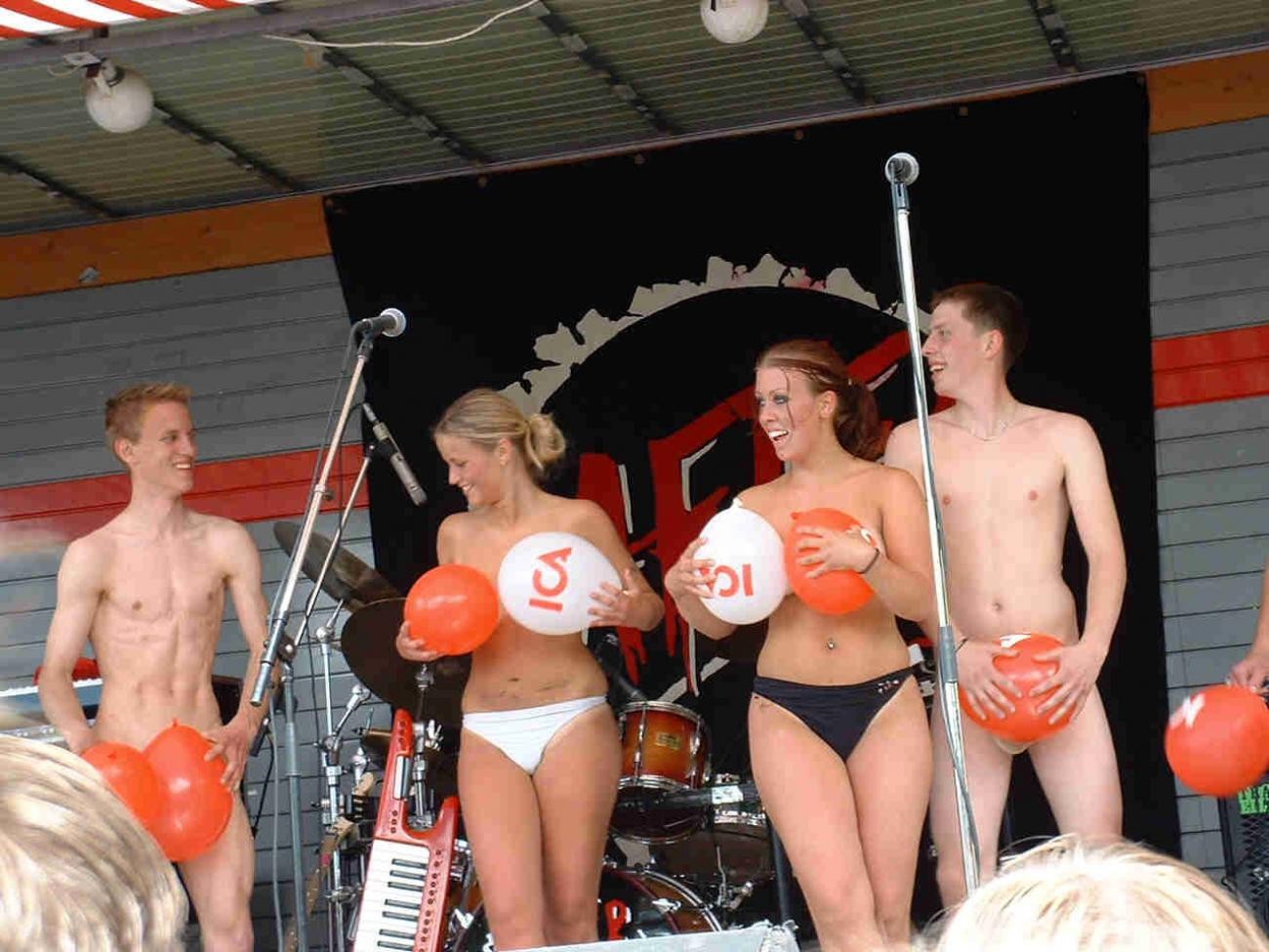 Outdoor event featuring trashy, naked girls on stage #77134089