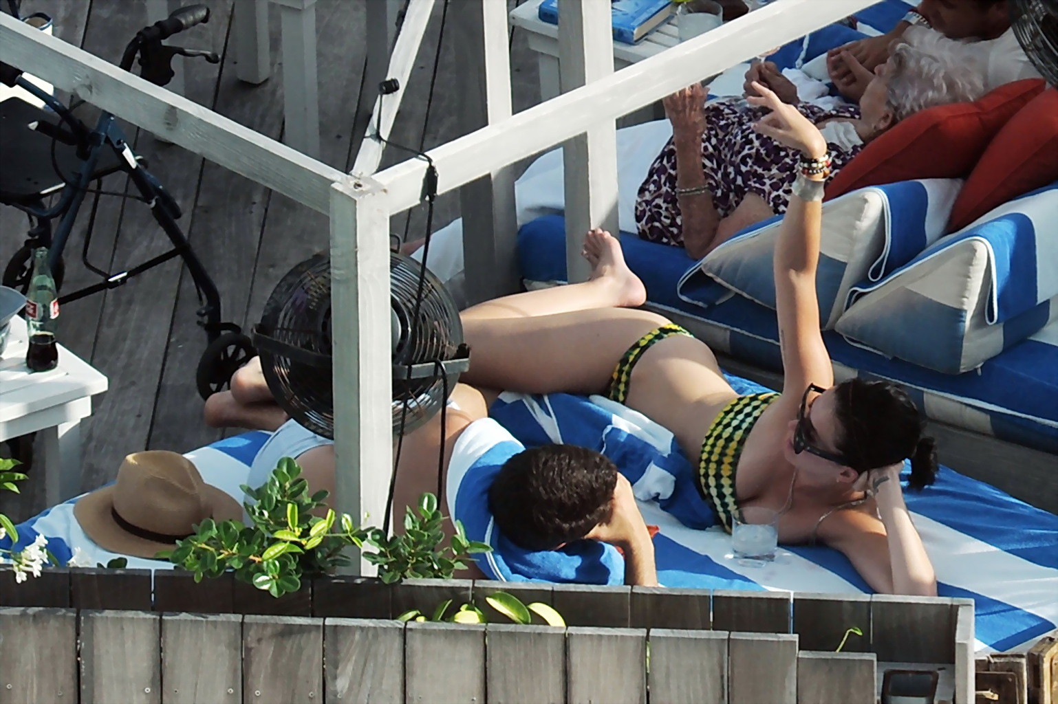 Katy Perry wearing yellow-green strapless bikini at the pool in Miami #75255998