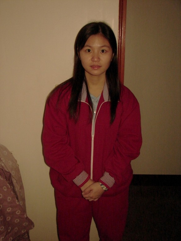 Cute And Chubby Chinese Girl Posing For The Camera