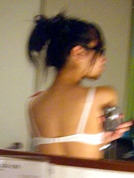 Cute Asian teen with glasses taking selfpics #69962508