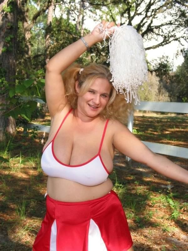 Huge boobs fat blonde in cheerleader uniform teasing outdoors #71830960