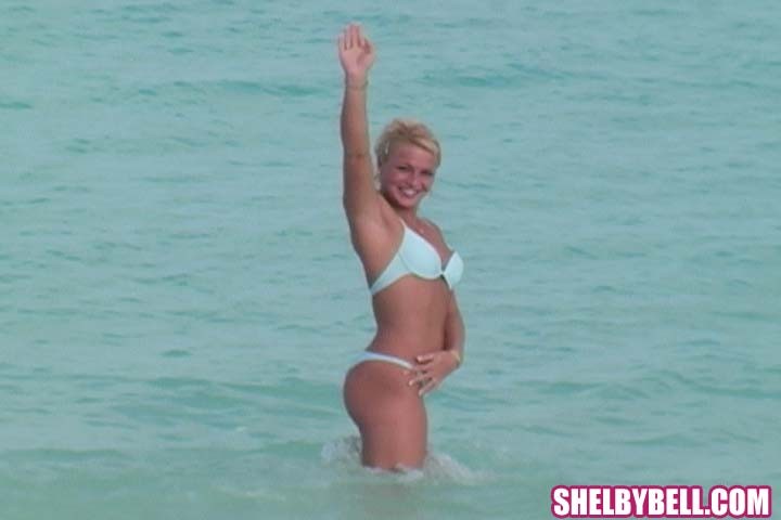 Blonde seaside lady Shelby Bell masturbating with a blue dildo