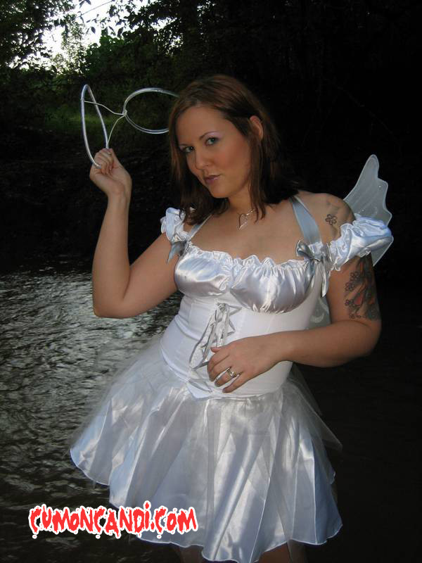 Candi In Fairy Costume Outside By Creek #70668283