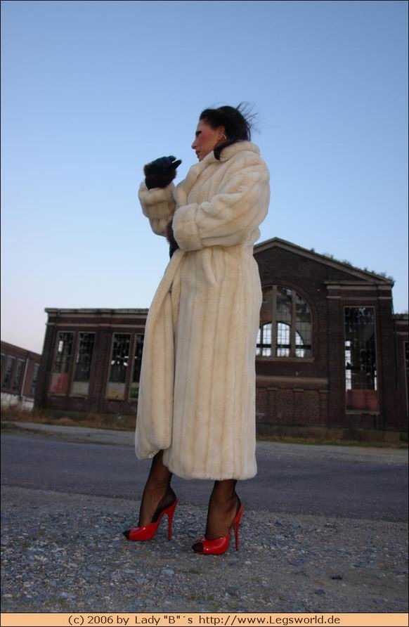 Kinky german lady in fur posing outdoor #76485657