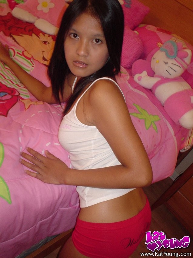 Exotic Cutie Kat gets frisky playing and posing on her bed #69998143