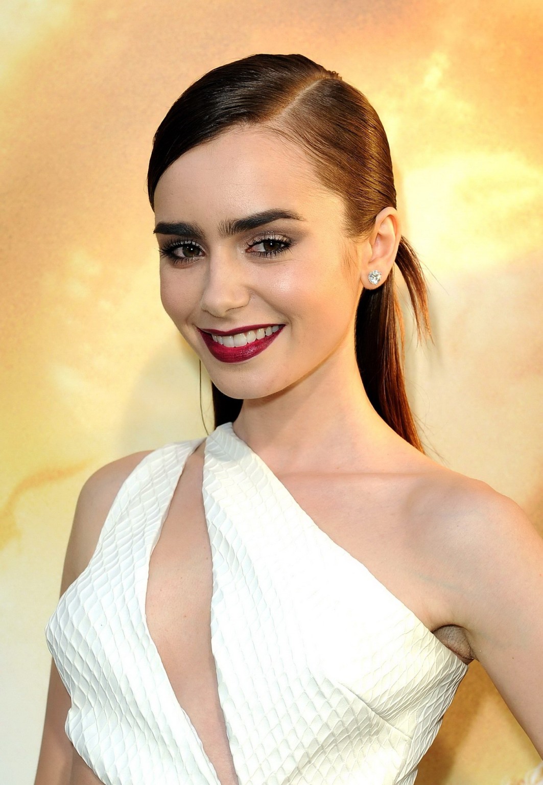 Lily Collins showing huge cleavage braless in short white cut-out dress at The M #75221725