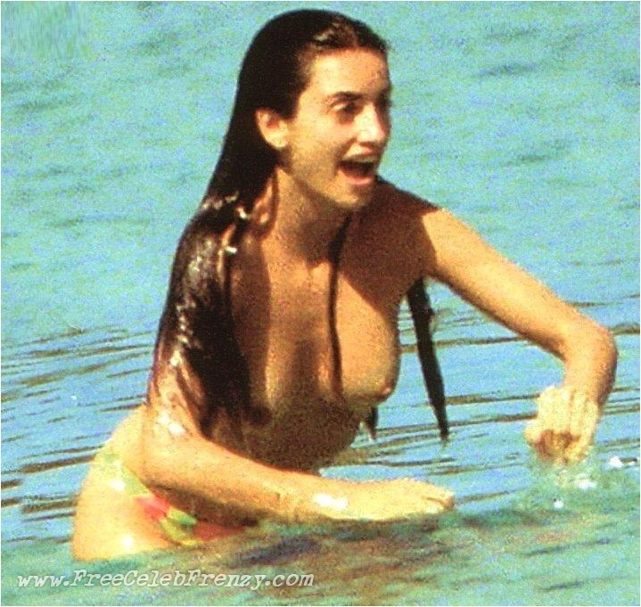 Penelope Cruz shows her brown boobs on the beach #72314787