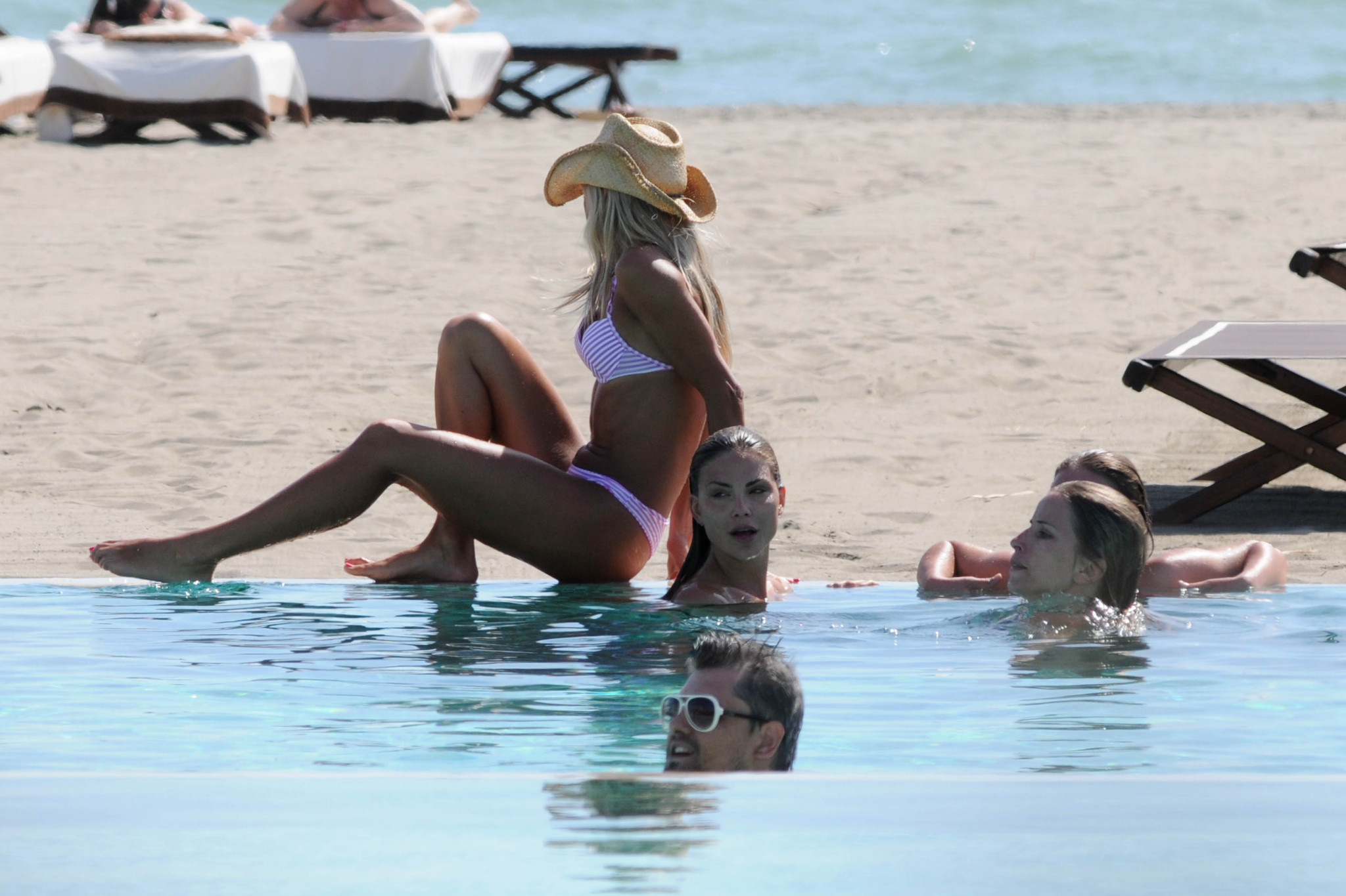 Nina Senicar shows off her ass wearing thong bikini on the Italian beach #75301371