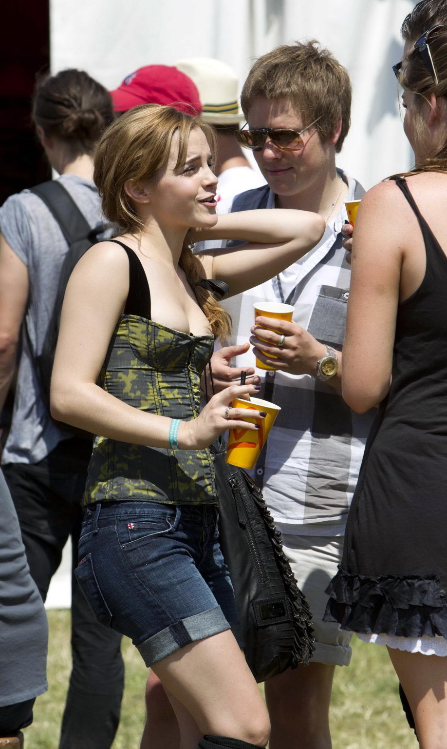 Emma Watson leggy  cleavy wearing low cut top, shorts  bots at Glastonbury Music #75343776