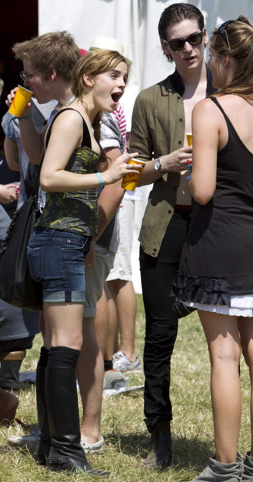 Emma Watson leggy  cleavy wearing low cut top, shorts  bots at Glastonbury Music #75343789