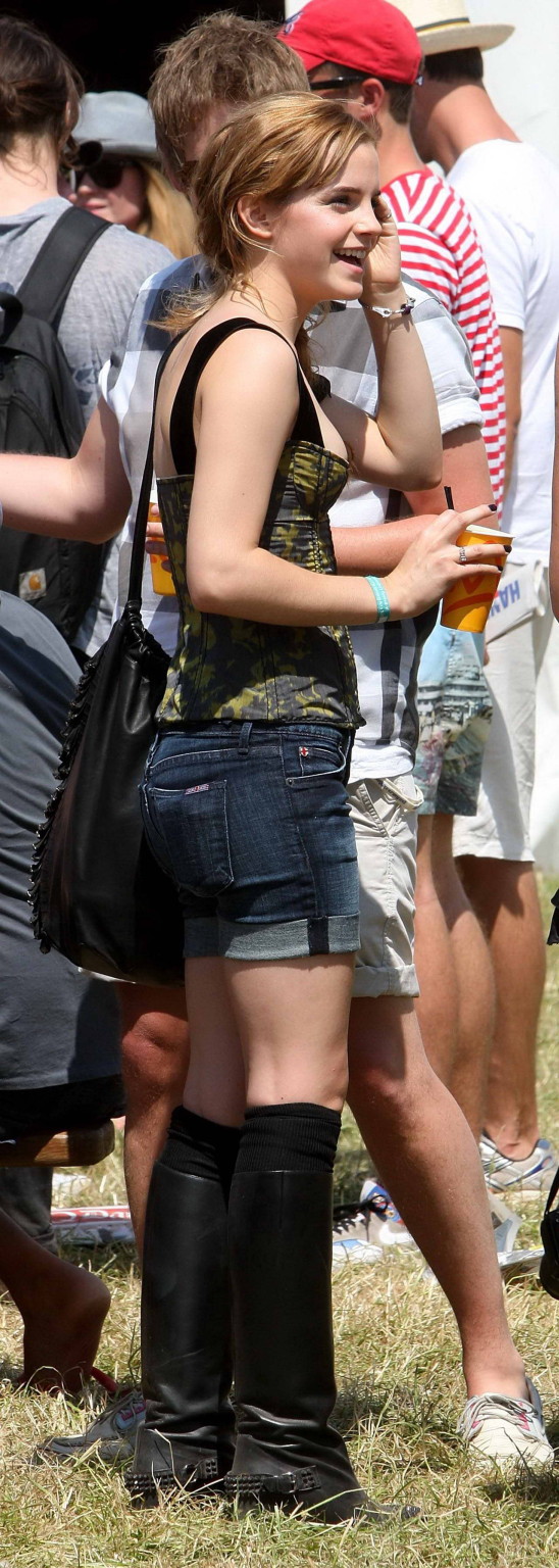 Emma Watson leggy  cleavy wearing low cut top, shorts  bots at Glastonbury Music #75343881