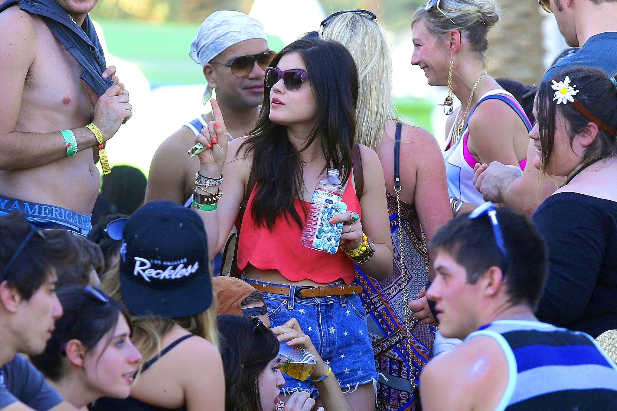 Lucy Hale wearing tiny red belly top and denim shorts at 2013 Coachella Music an #75234737