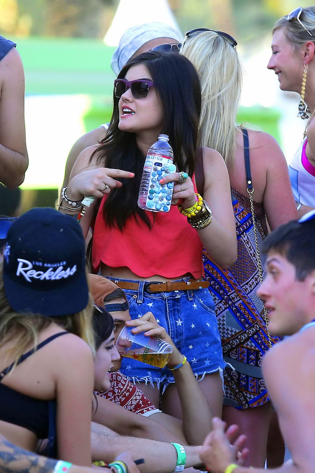 Lucy Hale wearing tiny red belly top and denim shorts at 2013 Coachella Music an #75234769