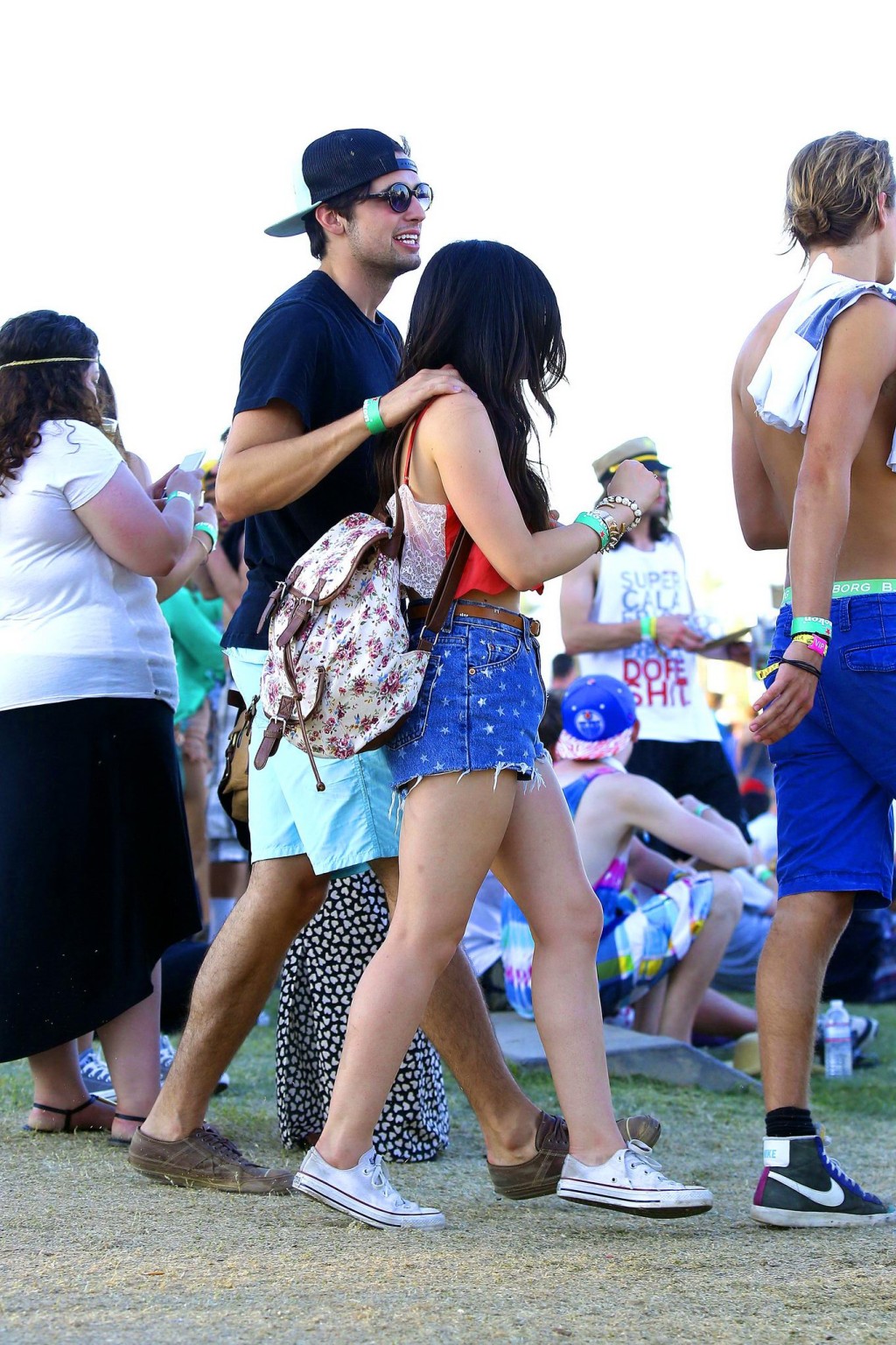Lucy Hale wearing tiny red belly top and denim shorts at 2013 Coachella Music an #75234810
