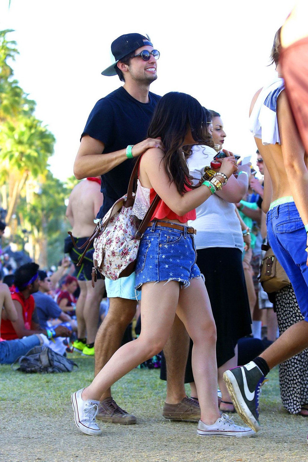 Lucy Hale wearing tiny red belly top and denim shorts at 2013 Coachella Music an #75234822