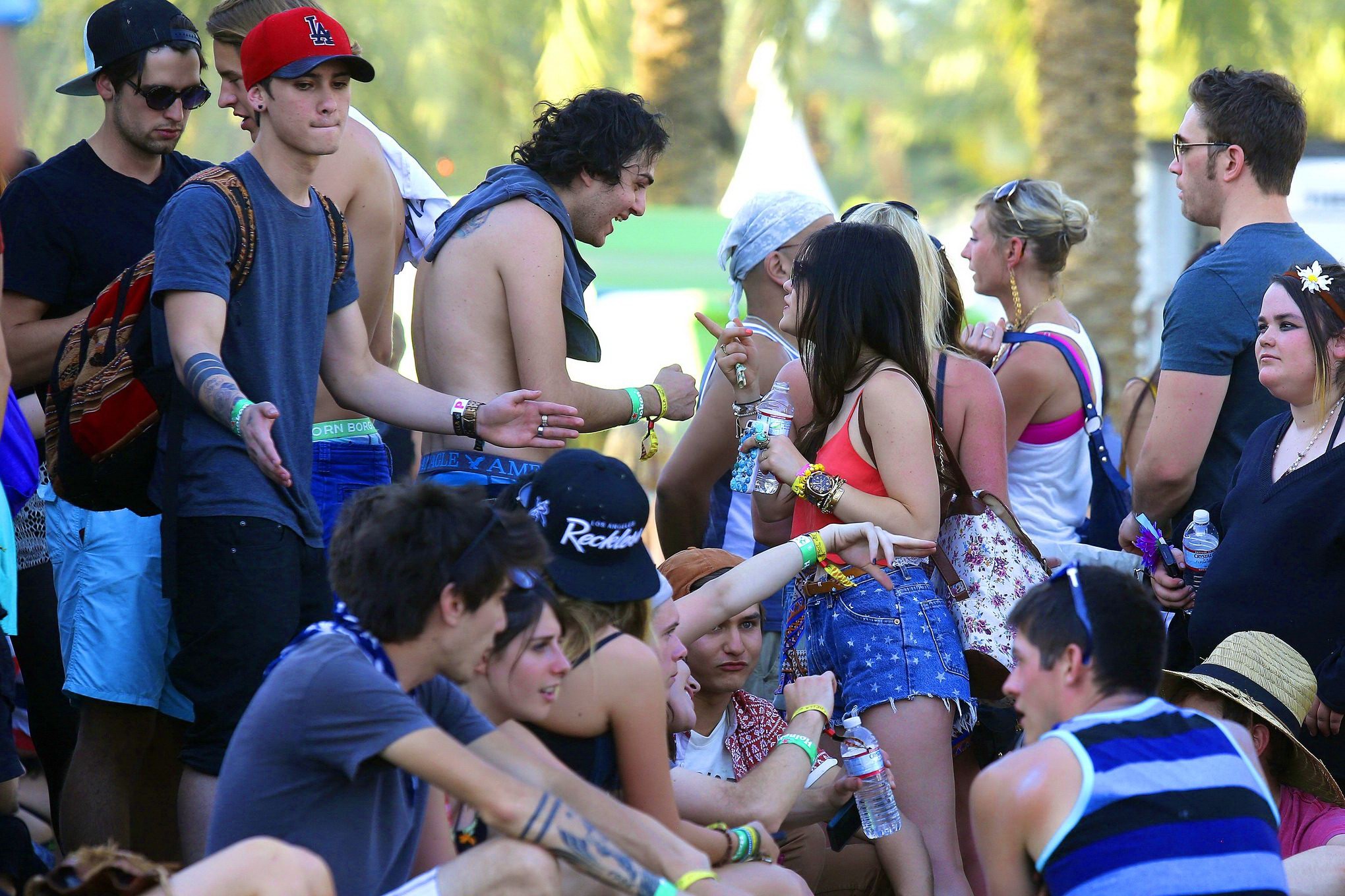 Lucy Hale wearing tiny red belly top and denim shorts at 2013 Coachella Music an #75234837
