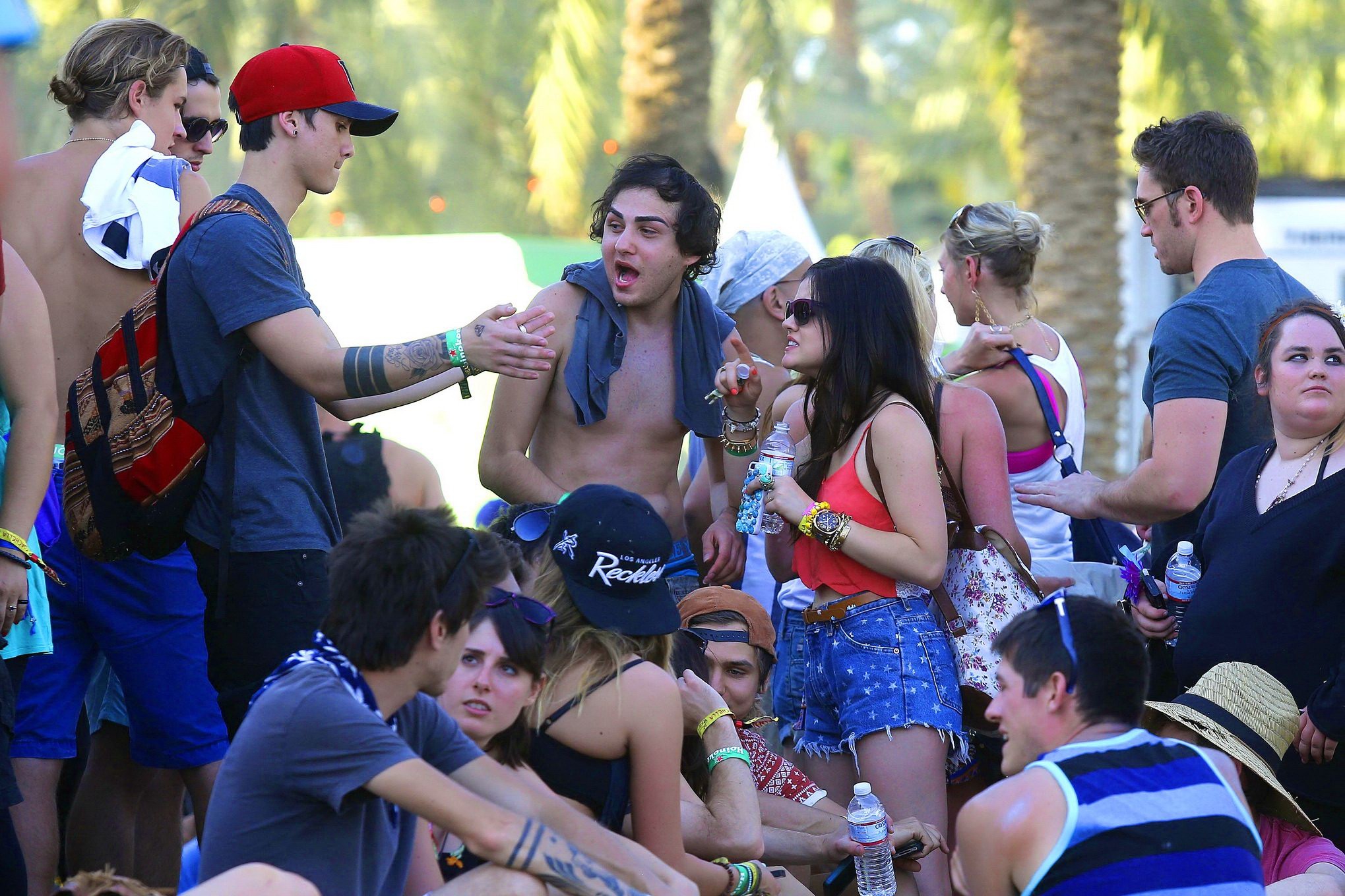 Lucy Hale wearing tiny red belly top and denim shorts at 2013 Coachella Music an #75234845