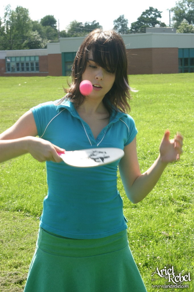 Sporty teen girl in skirt outside #67553755