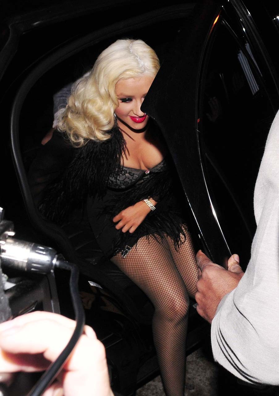 Christina Aguilera exposing her huge cleavage and lots of legs while exit from c #75307290