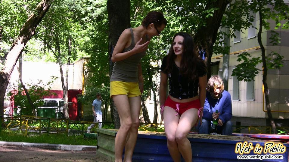 Public mess of two chicks in shorts who cannot control their bladders #78594689