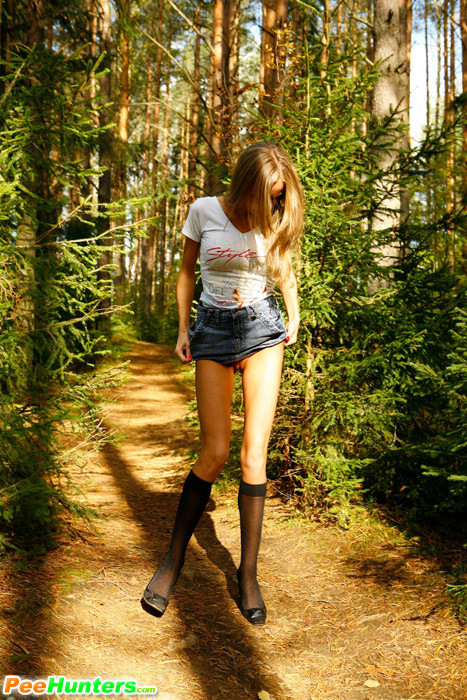 Blonde puss with gorgeous body pees on forest path #78692727