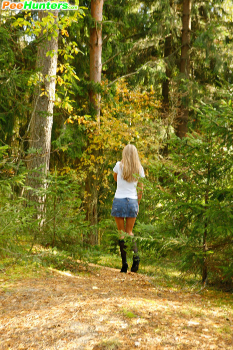 Blonde puss with gorgeous body pees on forest path #78692741