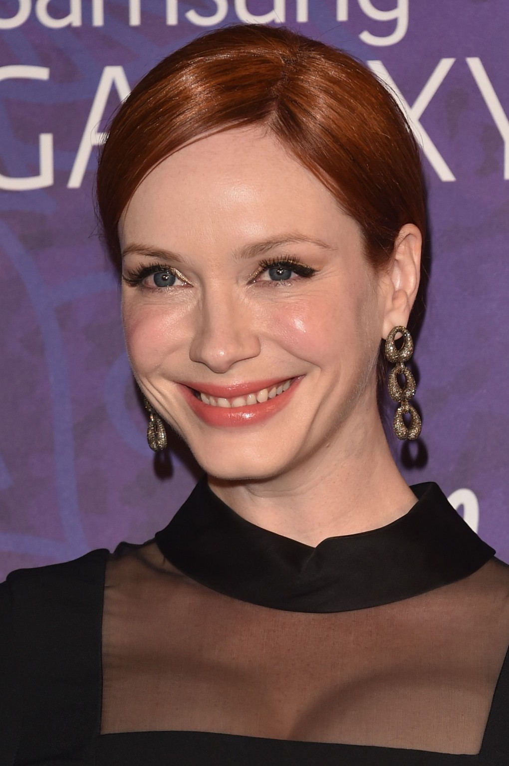Christina Hendricks showing cleavage at the Variety and Women in Film Emmy Nomin #75188052