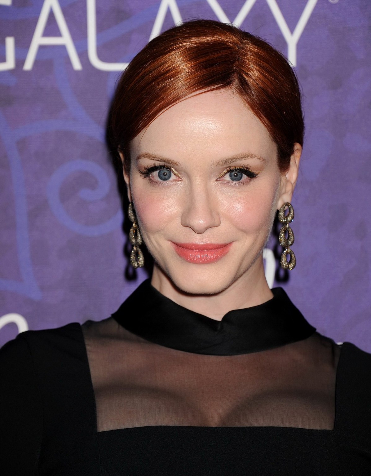 Christina Hendricks showing cleavage at the Variety and Women in Film Emmy Nomin #75188077