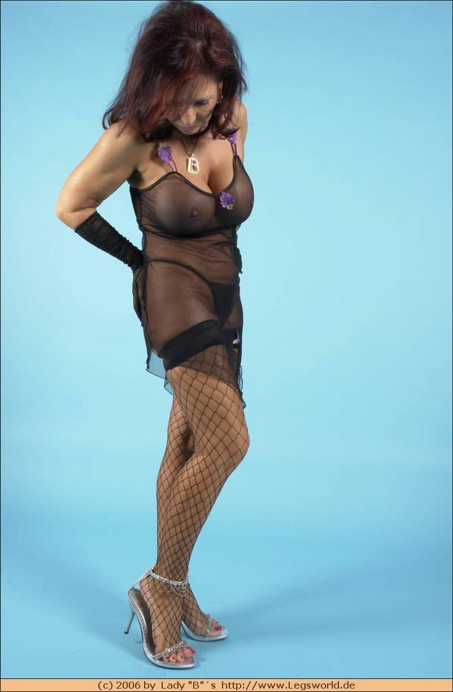 Lady Barbara foot fetish in black fishnet stockings #76482238