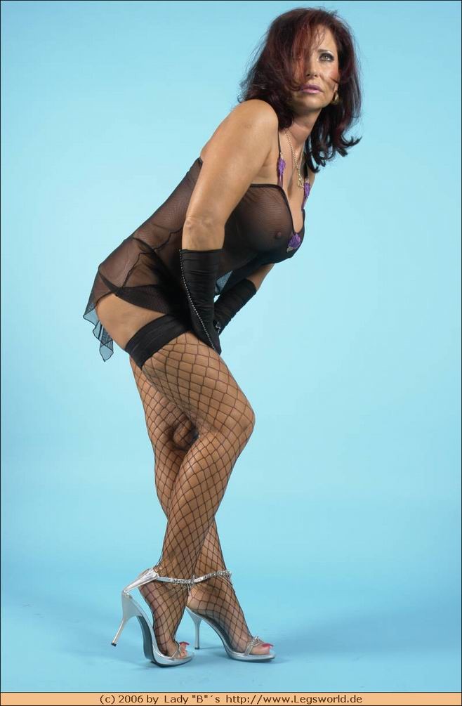 Lady Barbara foot fetish in black fishnet stockings #76482256