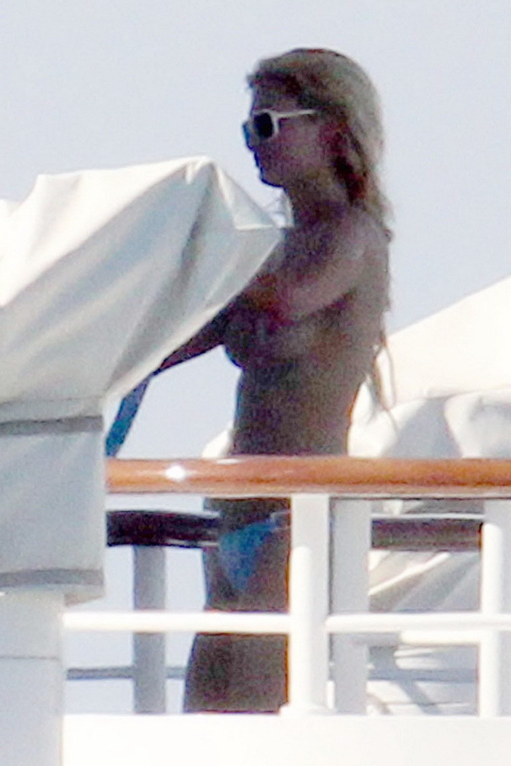 Paris Hilton topless showing off her small tits on a yacht in Italy #75340797