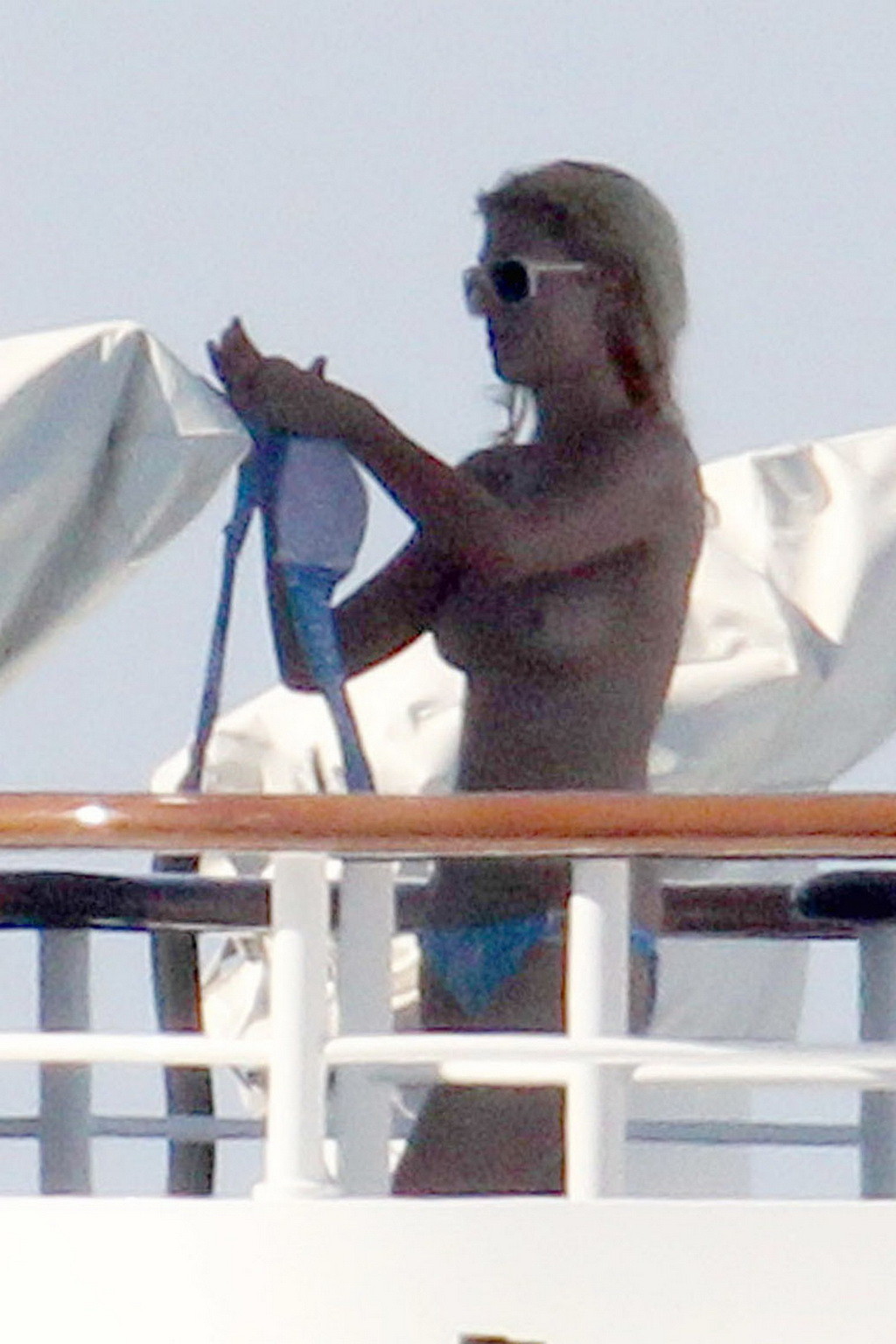 Paris Hilton topless showing off her small tits on a yacht in Italy #75340804