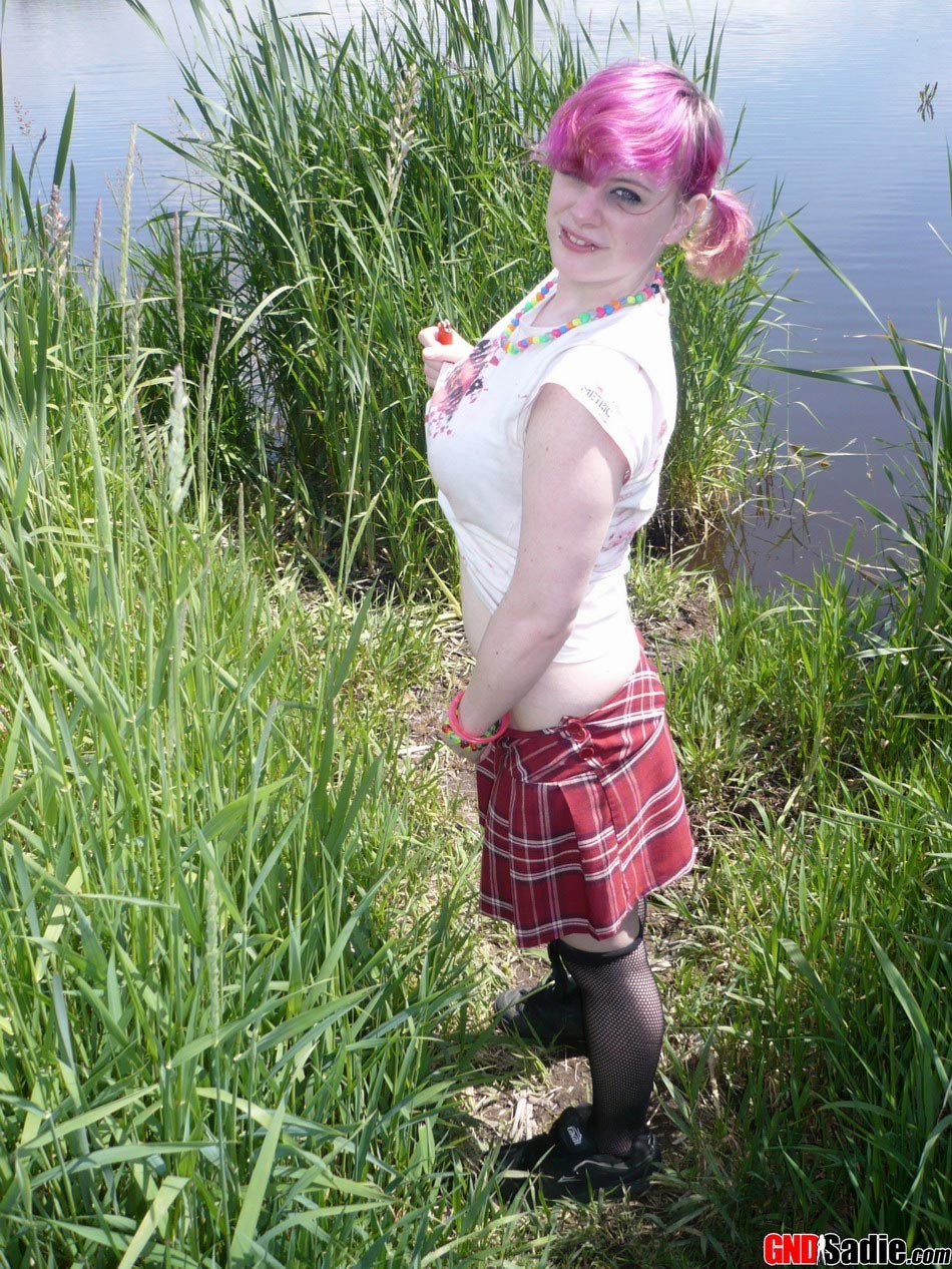 Alt punk girl Sadie stripping outdoors #73259616