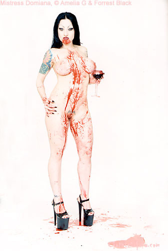 Tattooed vampire girl covers herself in blood #71005760