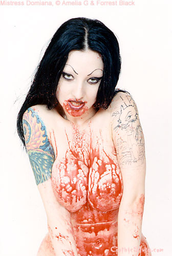 Tattooed vampire girl covers herself in blood #71005772