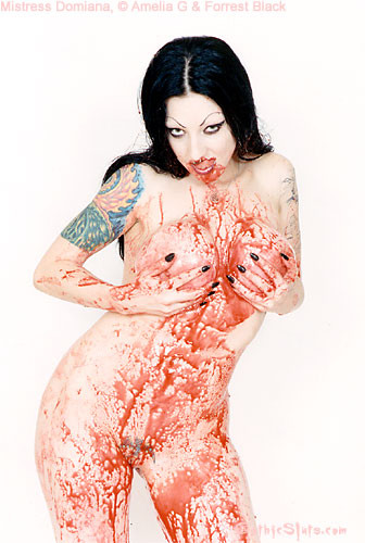 Tattooed vampire girl covers herself in blood #71005781