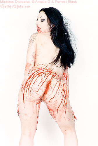 Tattooed vampire girl covers herself in blood #71005785