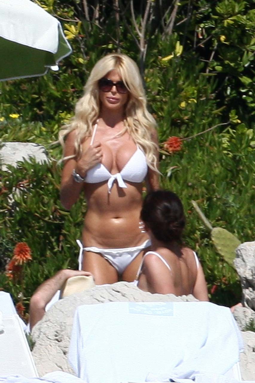 Victoria Silvstedt showing her great ass in white bikini on beach and upskirt #75302975