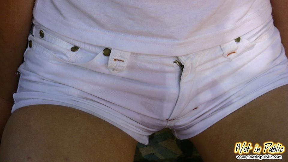 Public pissing shame of a babe in the white shorts and her nude pussy #73245300